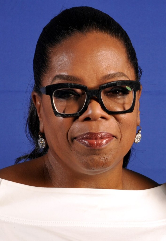 Oprah Winfrey, founder of Harpo Productions and the wealthiest of the richest Black women in America, smiles in a portrait