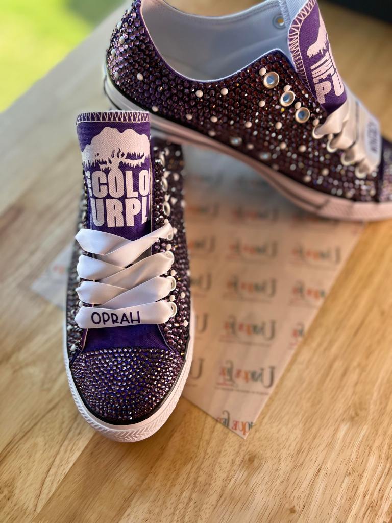 Oprah Winfrey wearing custom purple rhinestone sneakers by Jillian Lee of UniqueLee Creations
